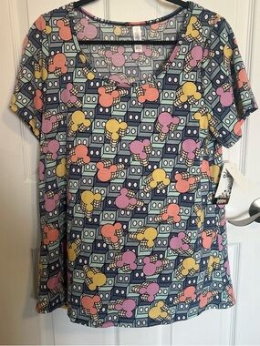 LuLaRoe Short Sleeve Tee in Blue with Pink, Yellow & Coral Motif